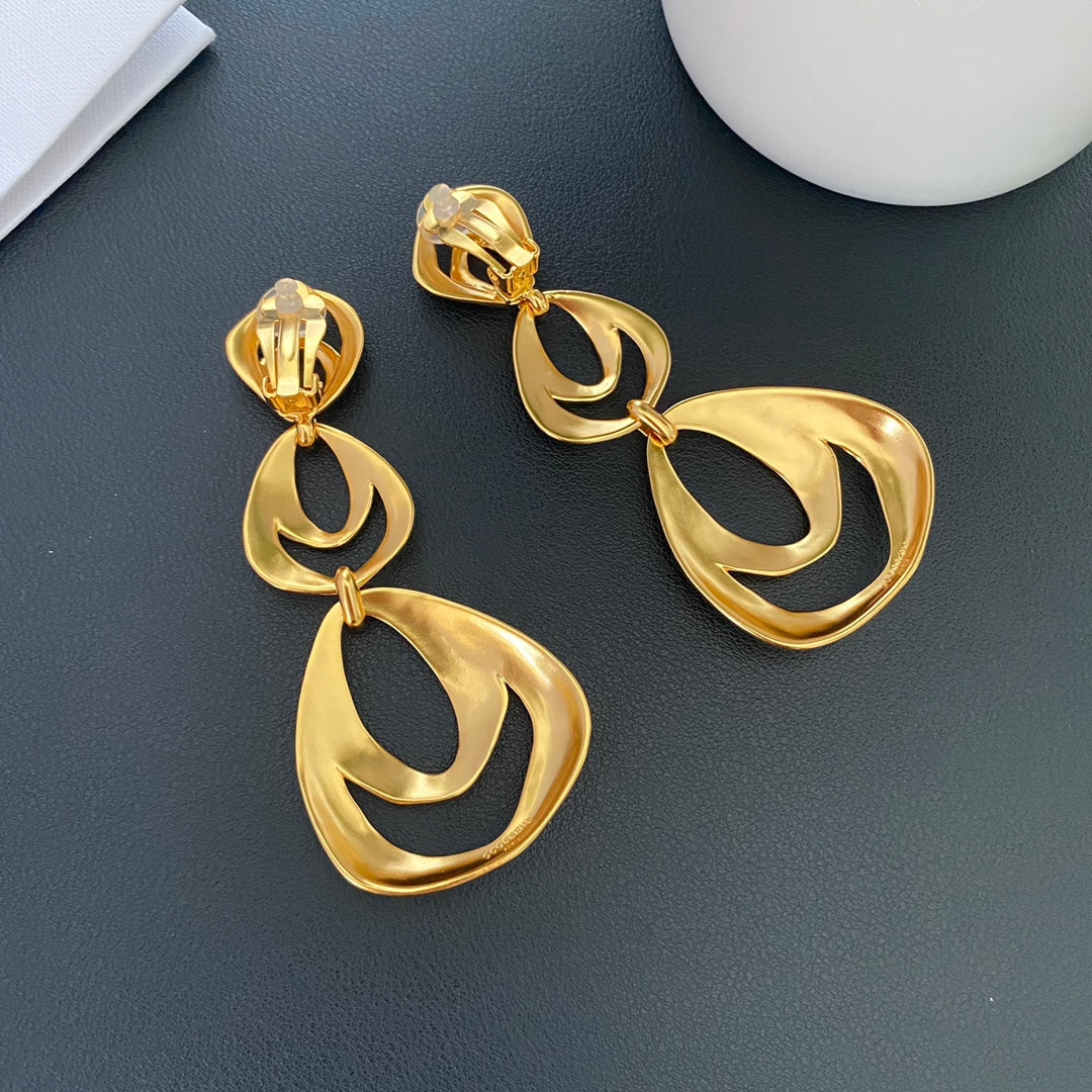 Back view of 24K gold-tone organic drop clip-on earrings