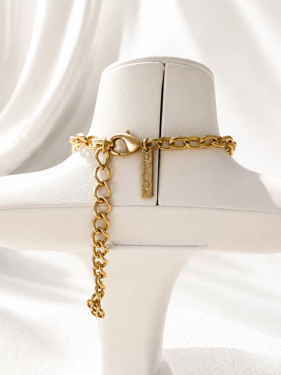 Gold-tone multicolor enamel-style floral necklace back clasp and adjustable chain detail