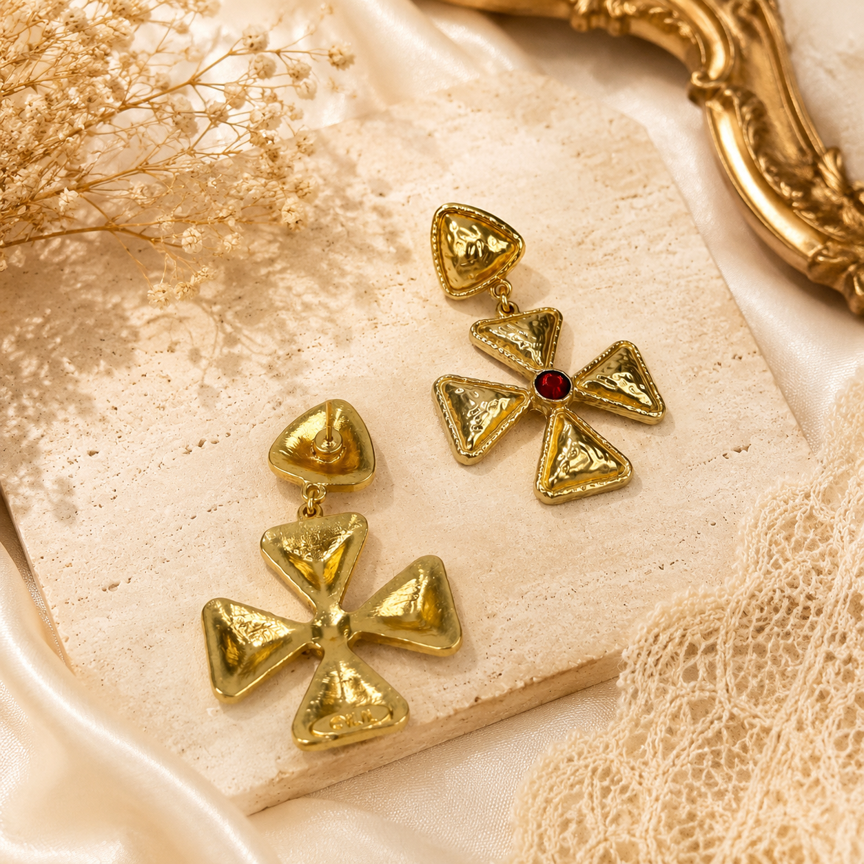 Gold-tone geometric cross drop stud earrings front and post-back detail