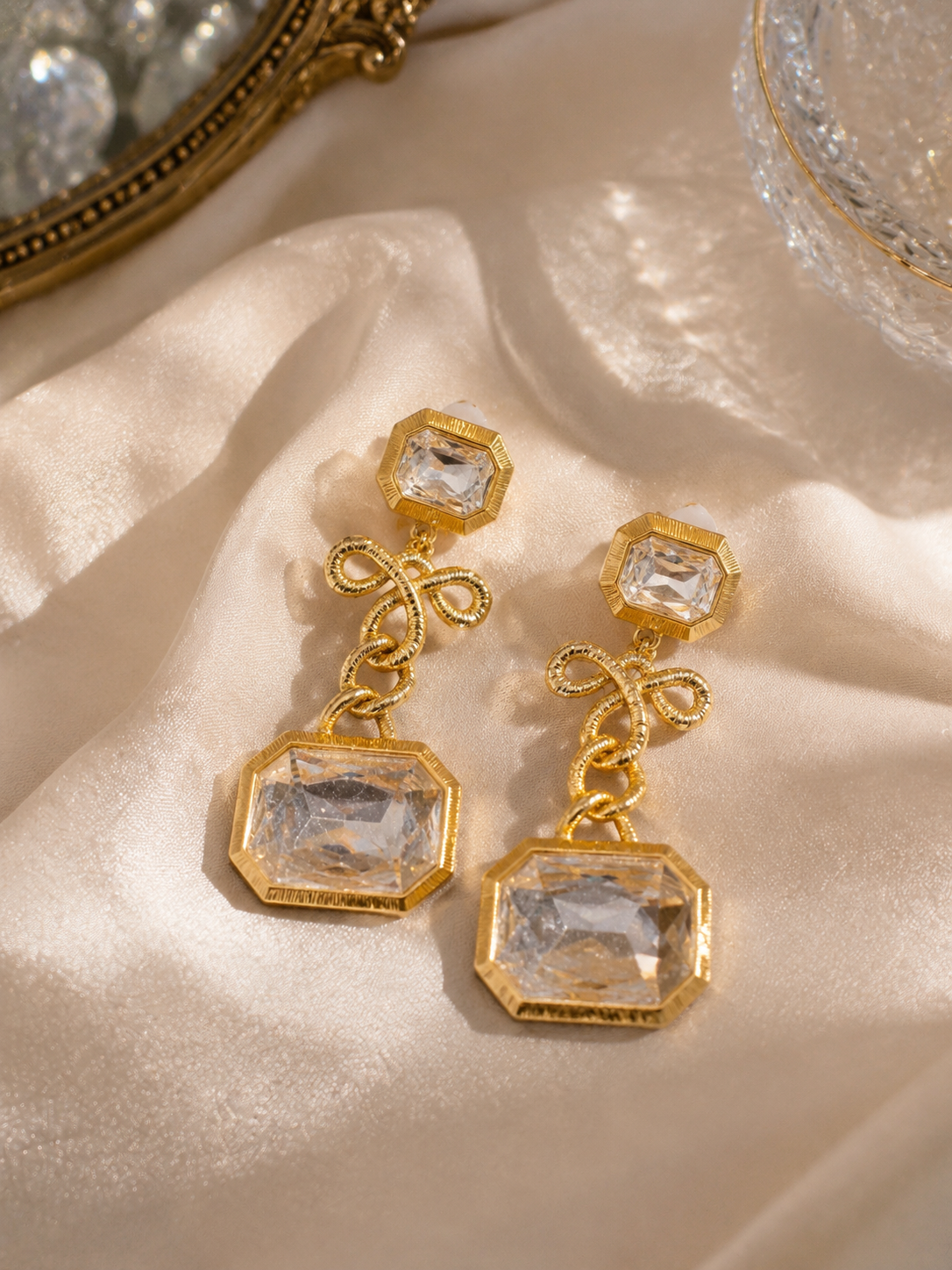 Gold-Tone Transparent Crystal Bow Sculptural Statement Ear Clip Earrings