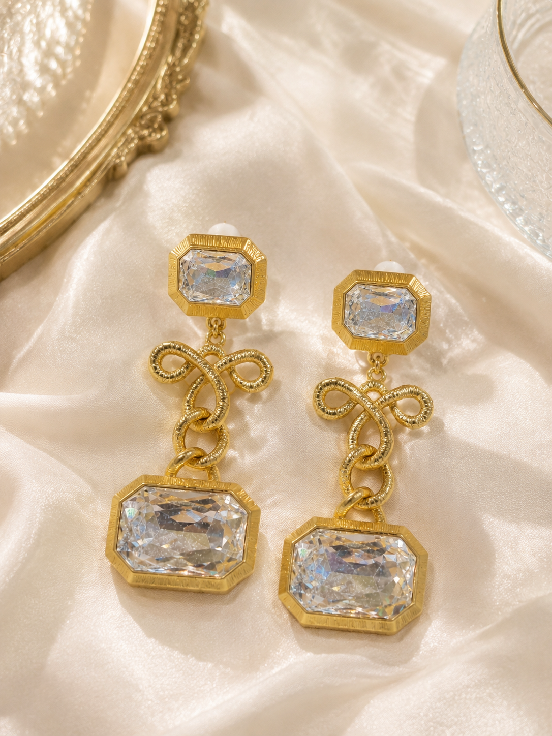 Gold-Tone Transparent Crystal Bow Sculptural Statement Ear Clip Earrings