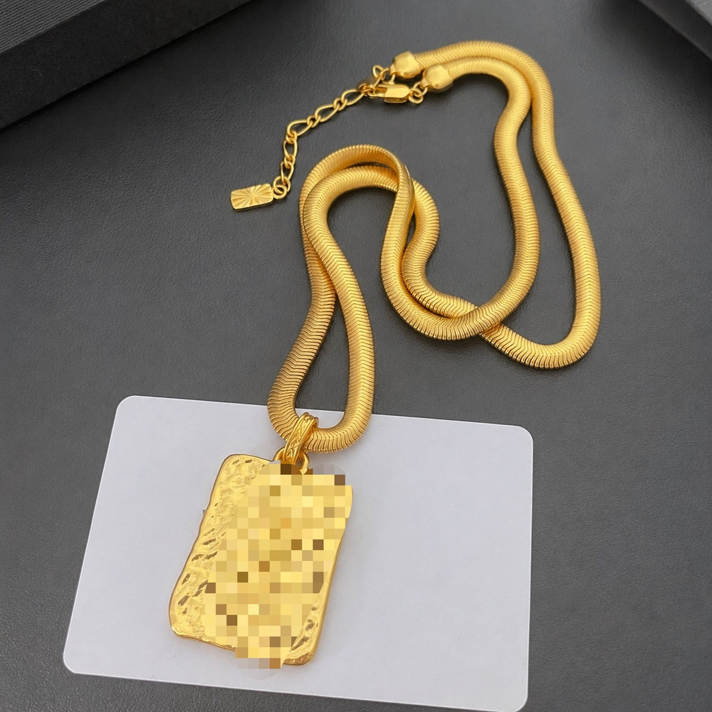 18K gold-plated vintage-inspired letter plaque pendant necklace with textured chain, front view
