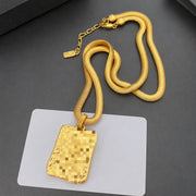 18K gold-plated vintage-inspired letter plaque pendant necklace with textured chain, front view