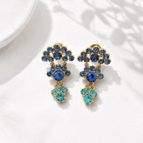 Gold-tone blue floral crystal-style drop stud earrings