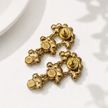 Gold-tone floral drop stud earrings rear detail