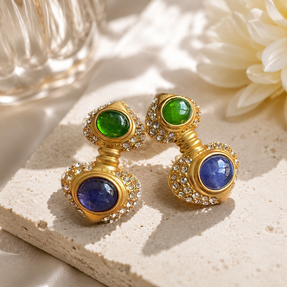 Gold-tone clip-on drop earrings with green and smoky gray accents