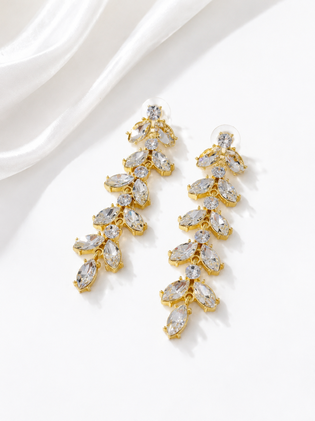 Clear gold-tone leaf rhinestone drop stud earrings