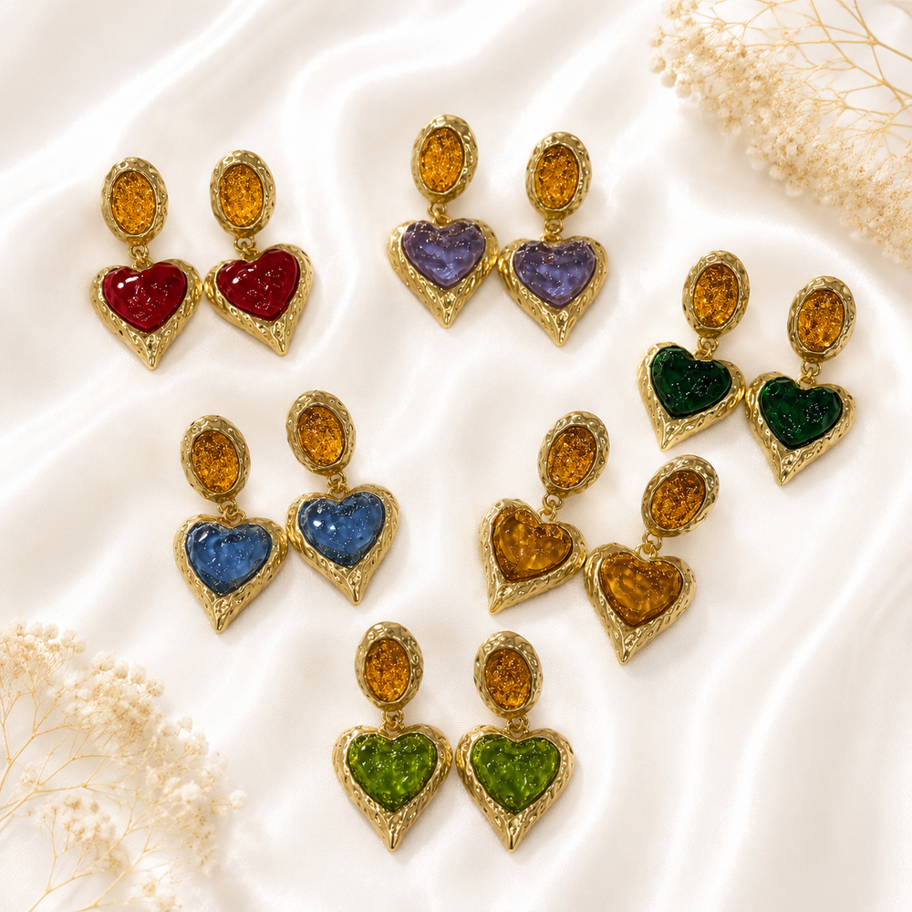 Glass heart drop earrings in six colors with gold-tone settings.