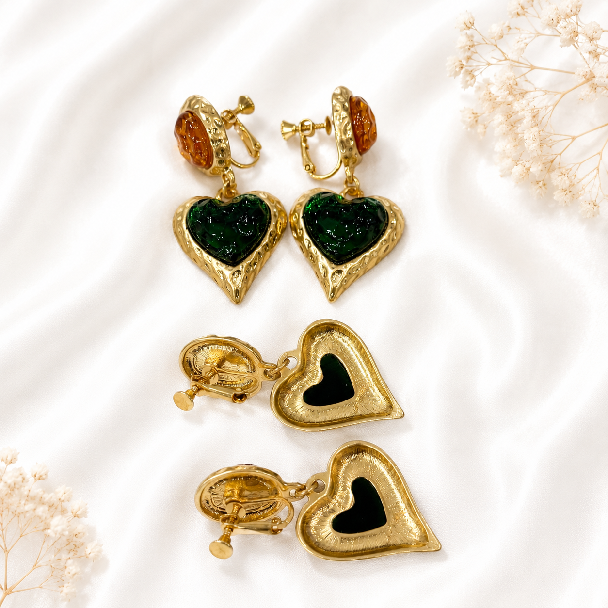 Dark green glass heart clip-on earrings, front and back view.