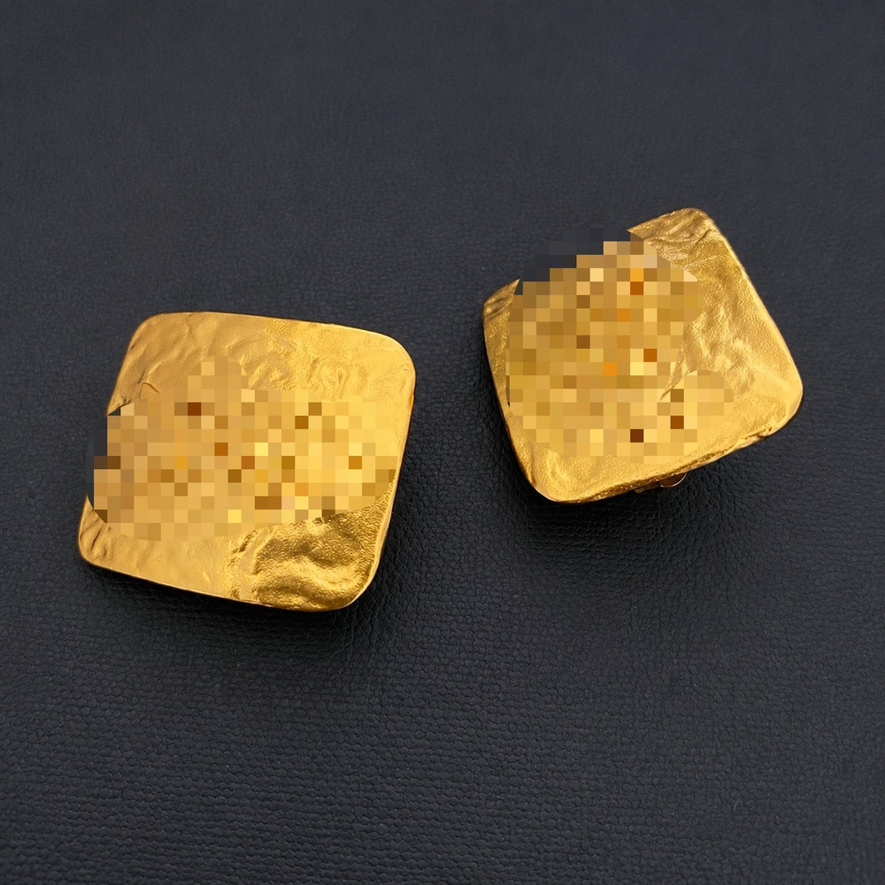 Front view of 24K gold-plated vintage-inspired square letter earrings