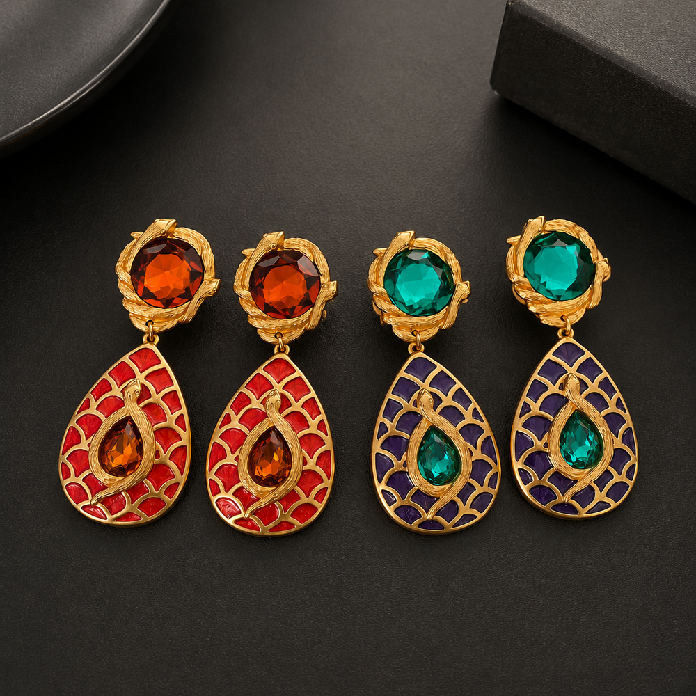 24K gold-tone dangle clip-on earrings in green and orange-red colorways, front view
