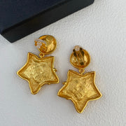 24K gold-tone vintage-inspired five-point star clip-on earrings, clip closure view