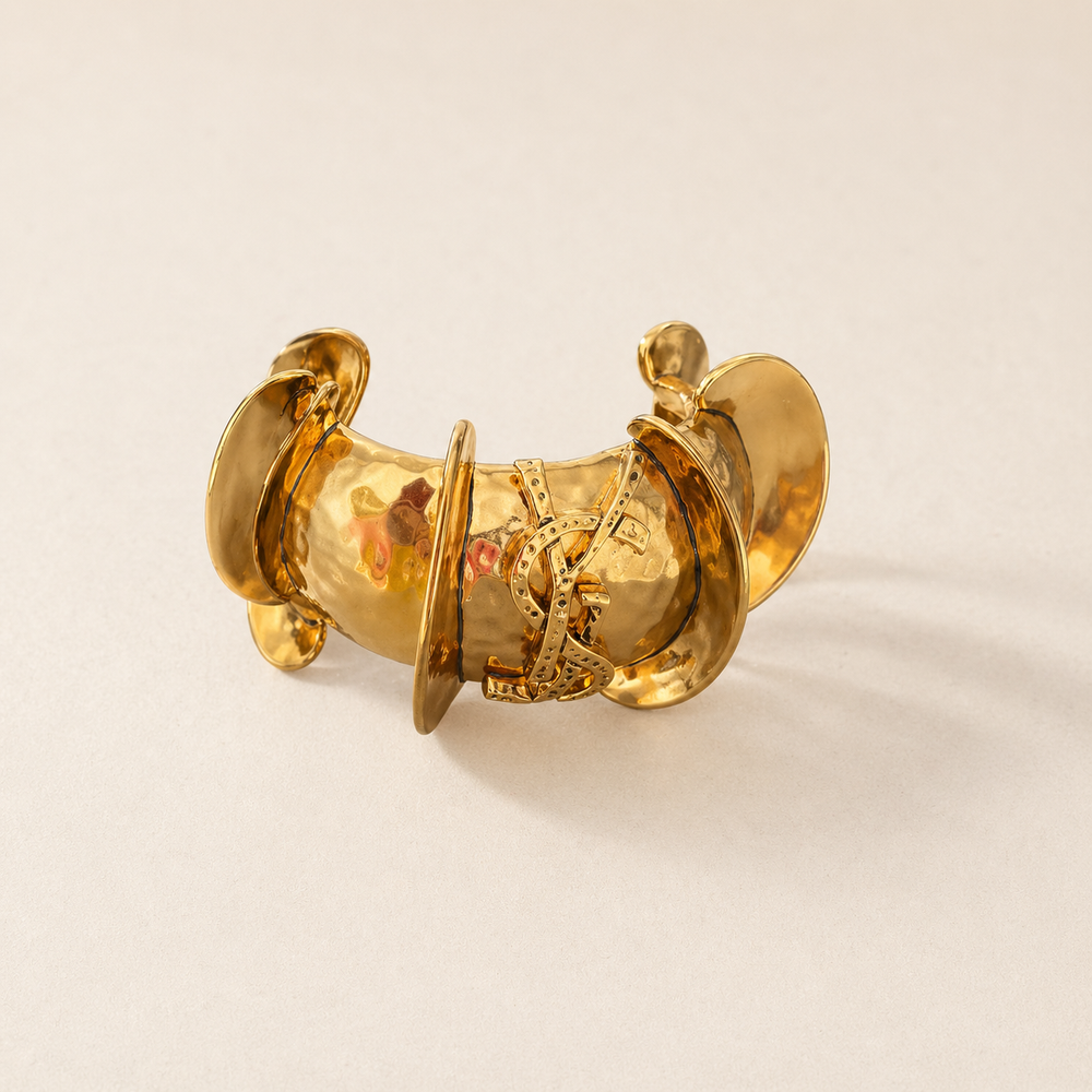Vintage-inspired sculptural gold-tone cuff bracelet front view
