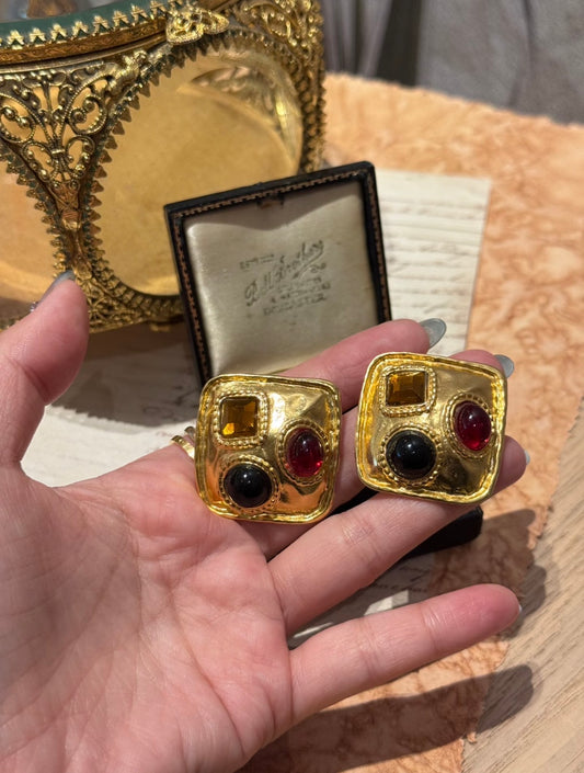 Gold-tone square clip-on statement earrings with red black and amber-tone accents