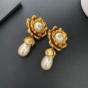 Full view of the sculptural flower petals and pearl-style teardrop drops