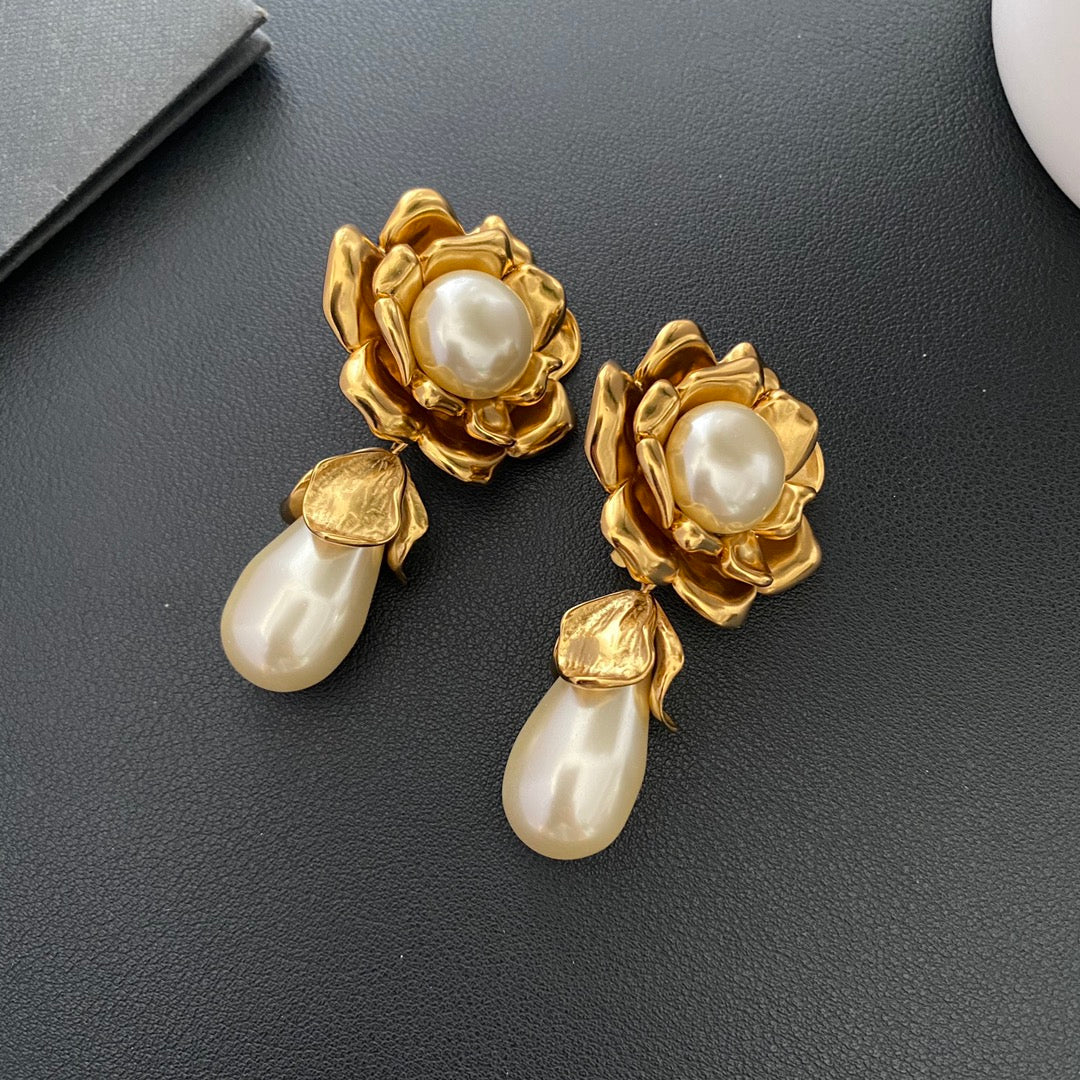 Full view of the sculptural flower petals and pearl-style teardrop drops