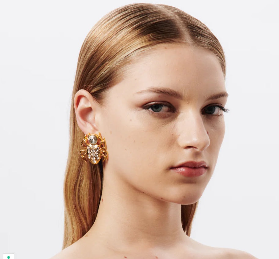 18K gold-plated spider clip-on earring shown worn on the ear