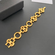 Extended view of the gold-tone geometric link bracelet