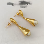 Angled rear view of 18K gold-plated drop stud earrings showing posts and butterfly backs