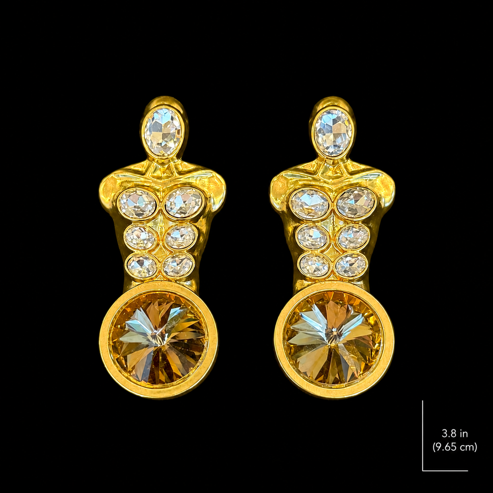 Pair of gold-tone sculptural drop earrings with clear faceted accents and amber-tone faceted drops