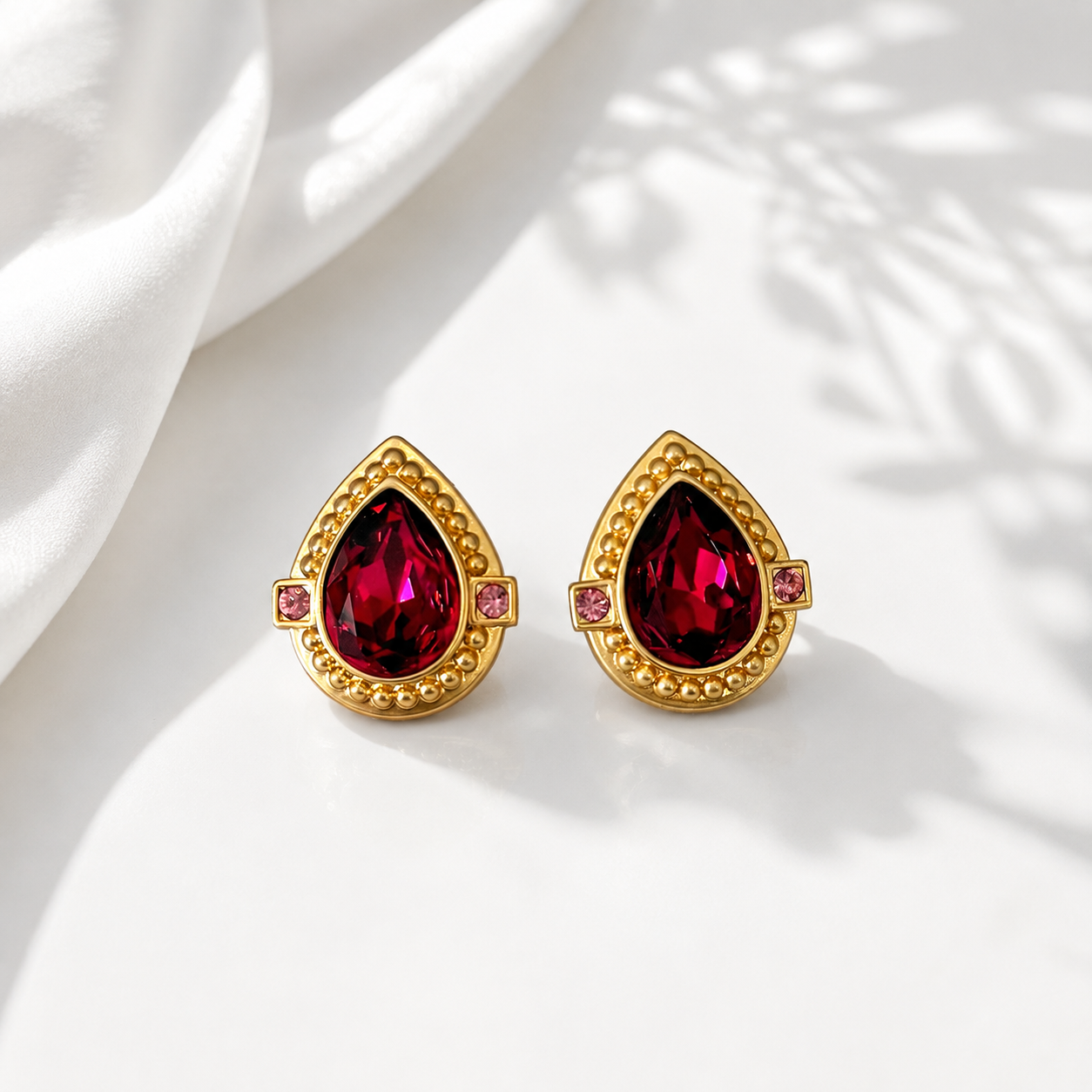 Fuchsia sparkling teardrop statement stud earrings