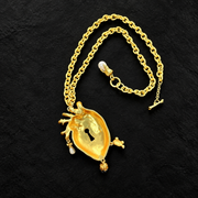 Reverse view of anatomical heart keyhole pendant necklace showing the hollow back and toggle fastening