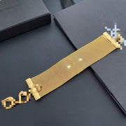 Reverse view of the gold-tone mesh bracelet band