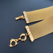 Detail of the choker mesh band, stone-set end bar and toggle closure