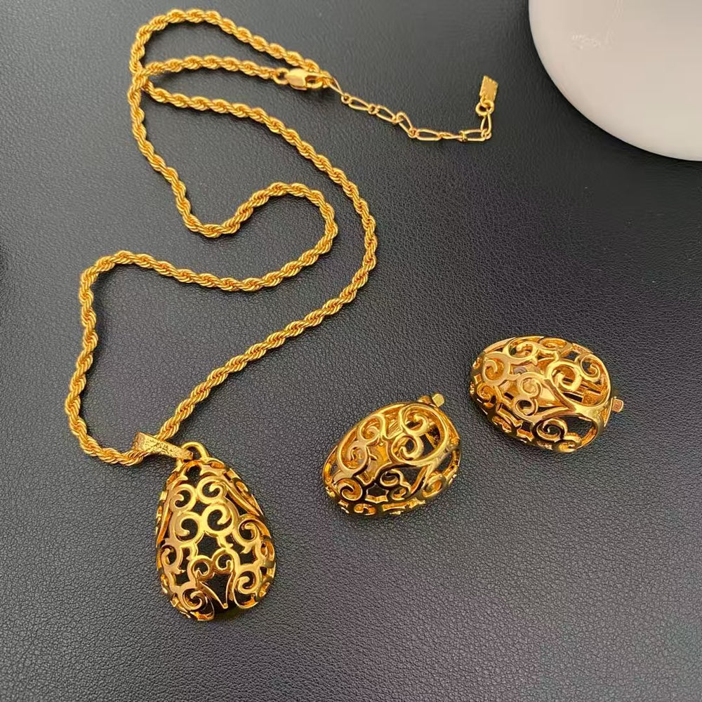 18K gold-plated openwork pendant necklace and matching clip-on earrings shown as a complete set