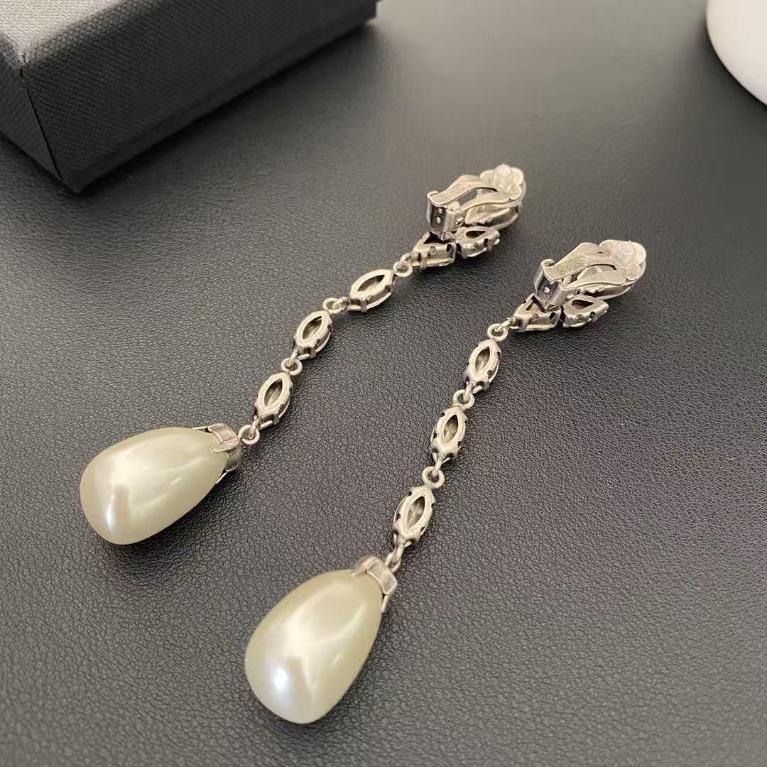 Back view showing the clip-on closures and linked marquise-shaped settings