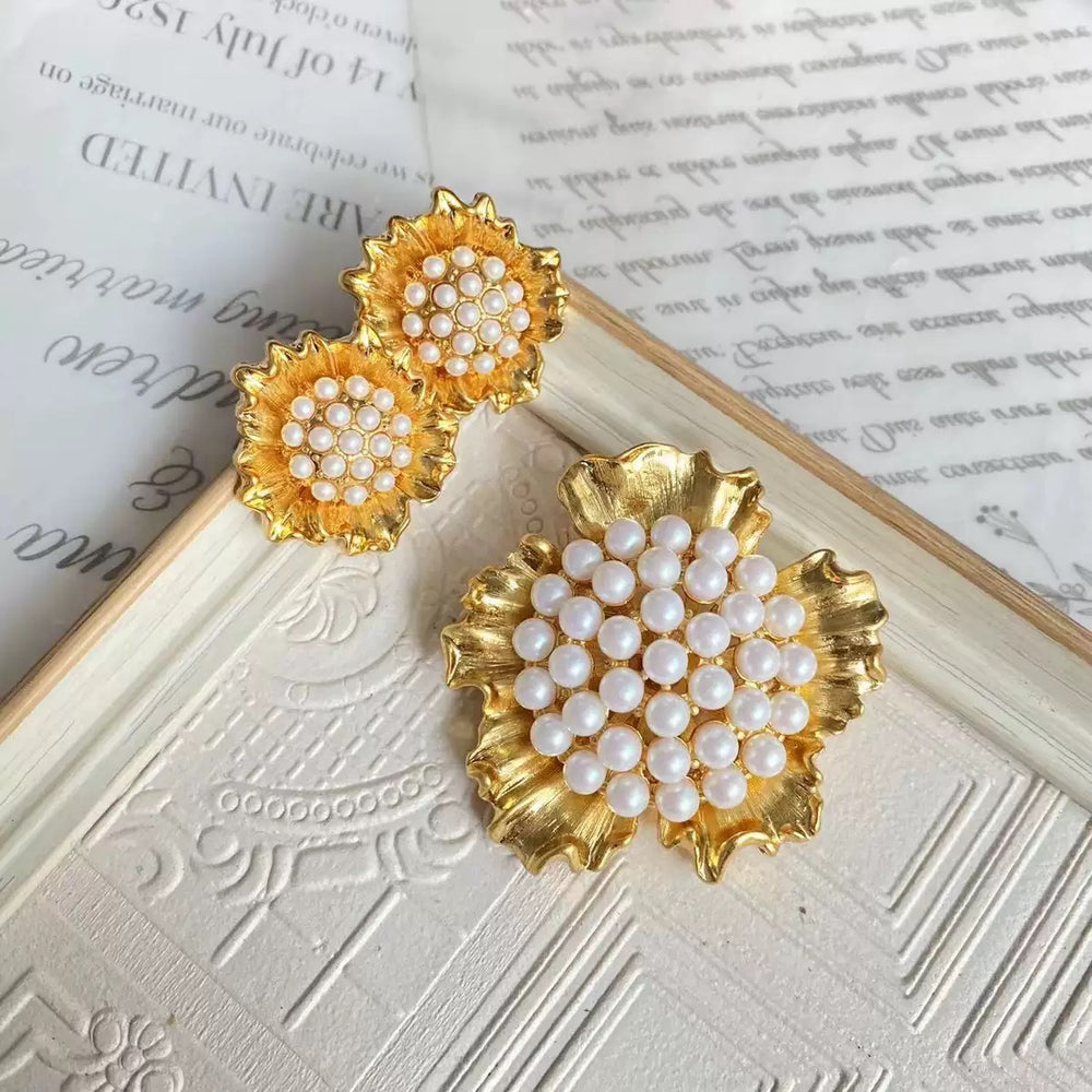 Gold-tone ruffled flower brooch and matching stud earrings with white pearl-style clusters