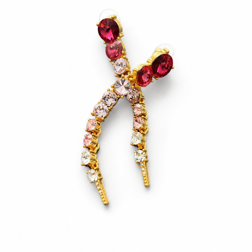 Gold-tone long linear stud earrings with rose pink faceted crystal-style accents