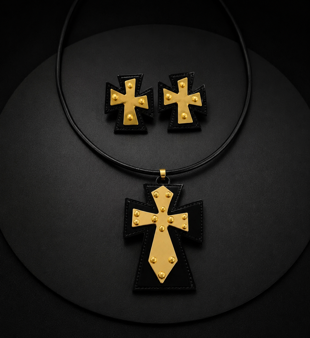 Black and gold-tone cross necklace and matching stud earrings set