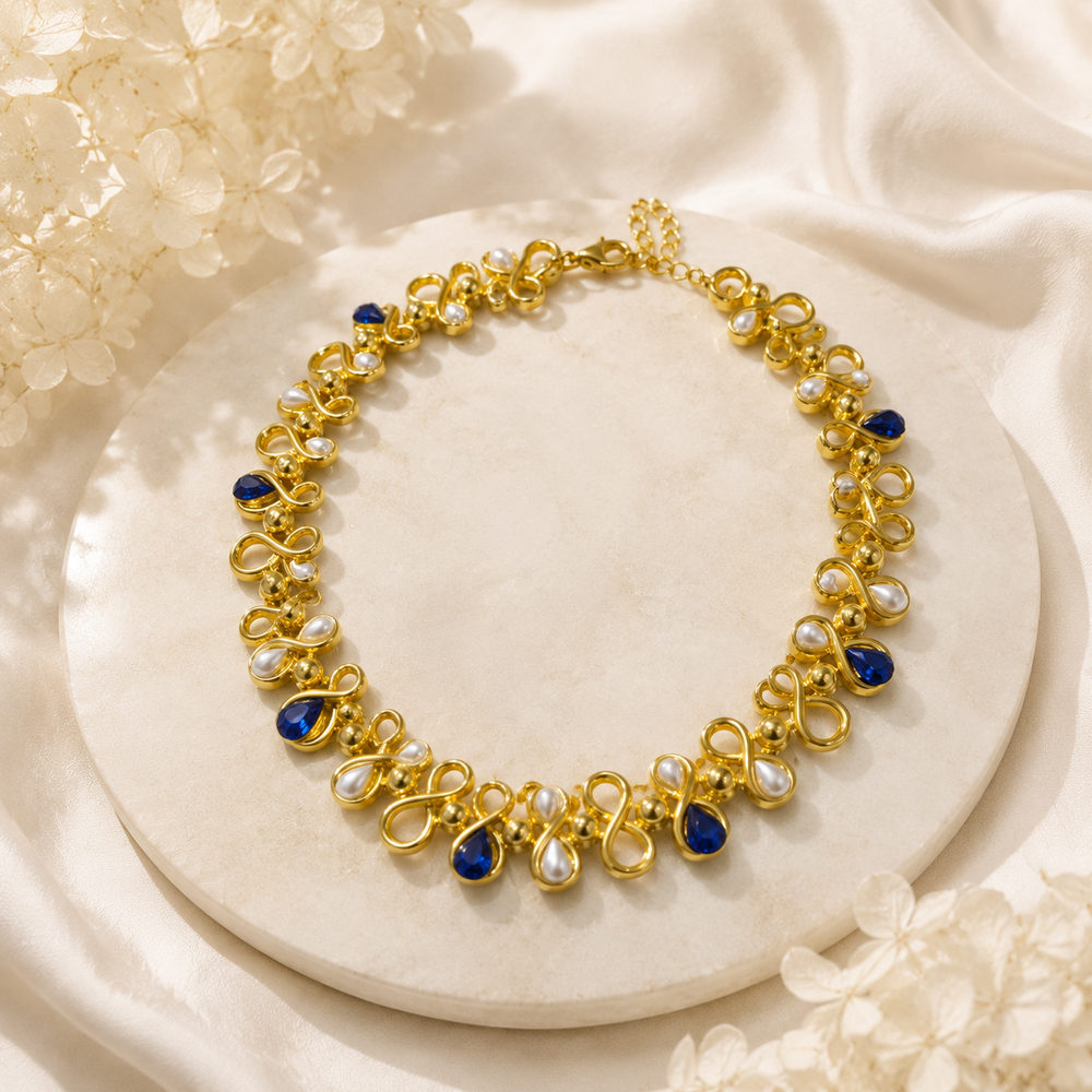 Gold-tone blue pearl-style heavy statement necklace front view