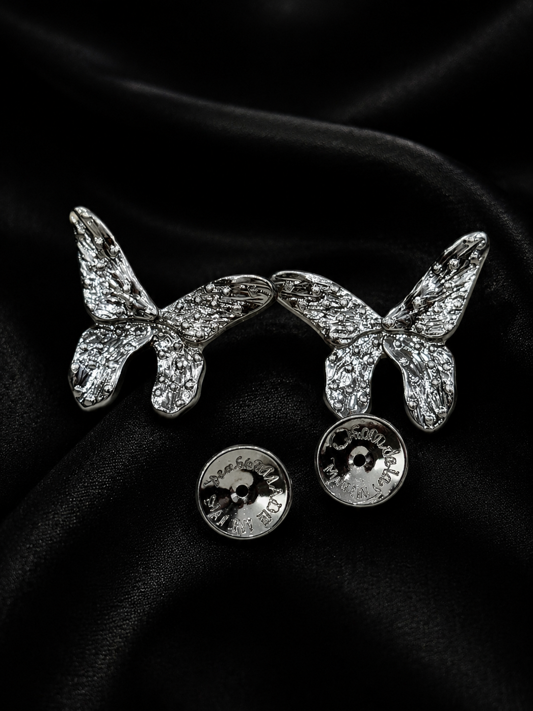 Silver-tone butterfly stud earrings with post backs