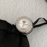 Silver-tone cat motif ring with clear faceted center accent and crystal-style halo