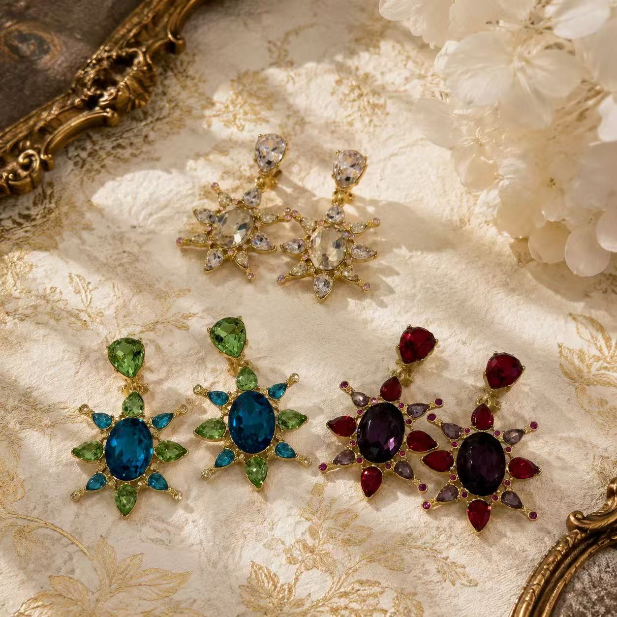 Elegant evening sparkle clip-on earrings in blue-green, burgundy, and pink champagne colorways