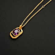 Purple faceted glass cube pendant necklace, close view
