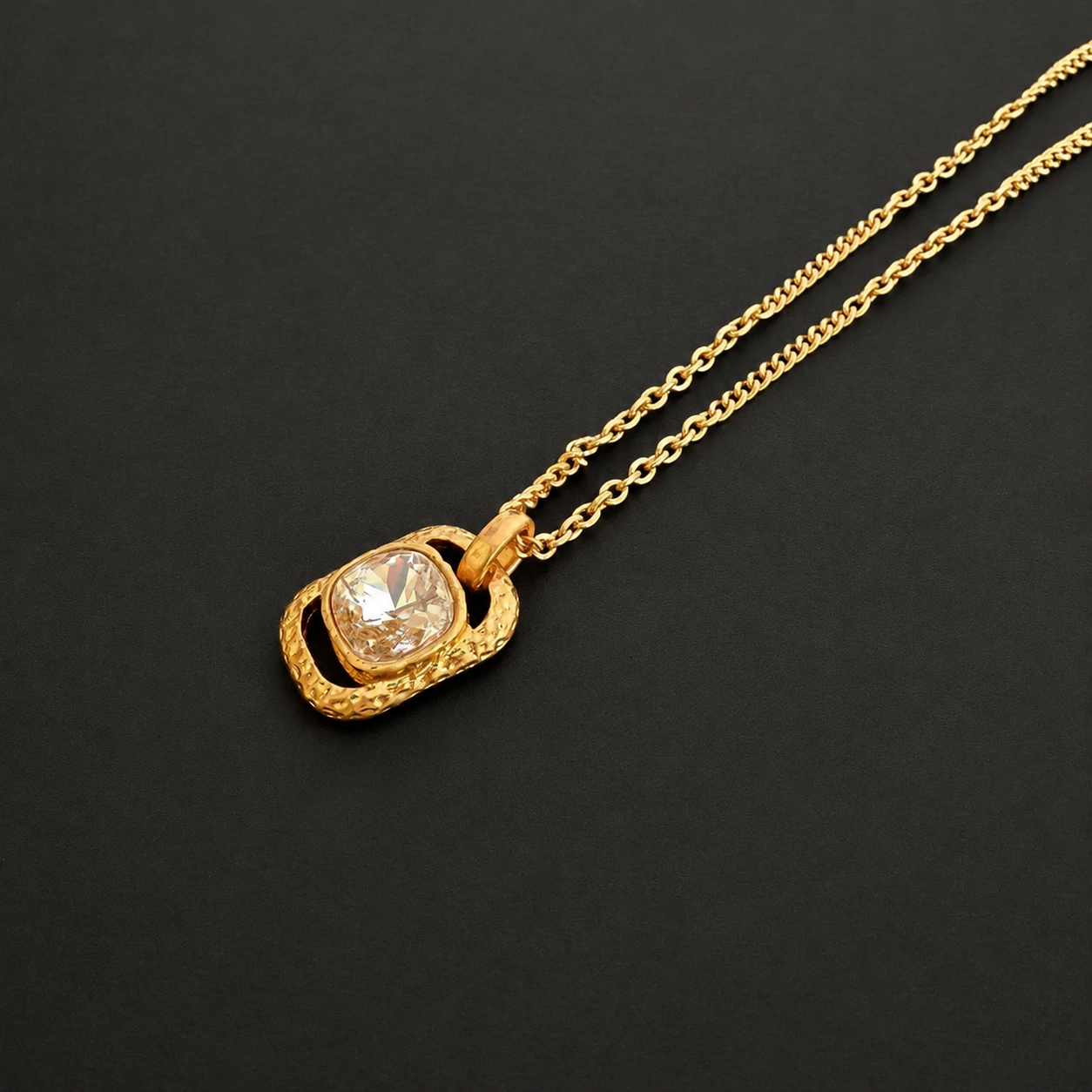 Transparent faceted glass cube pendant necklace, close view