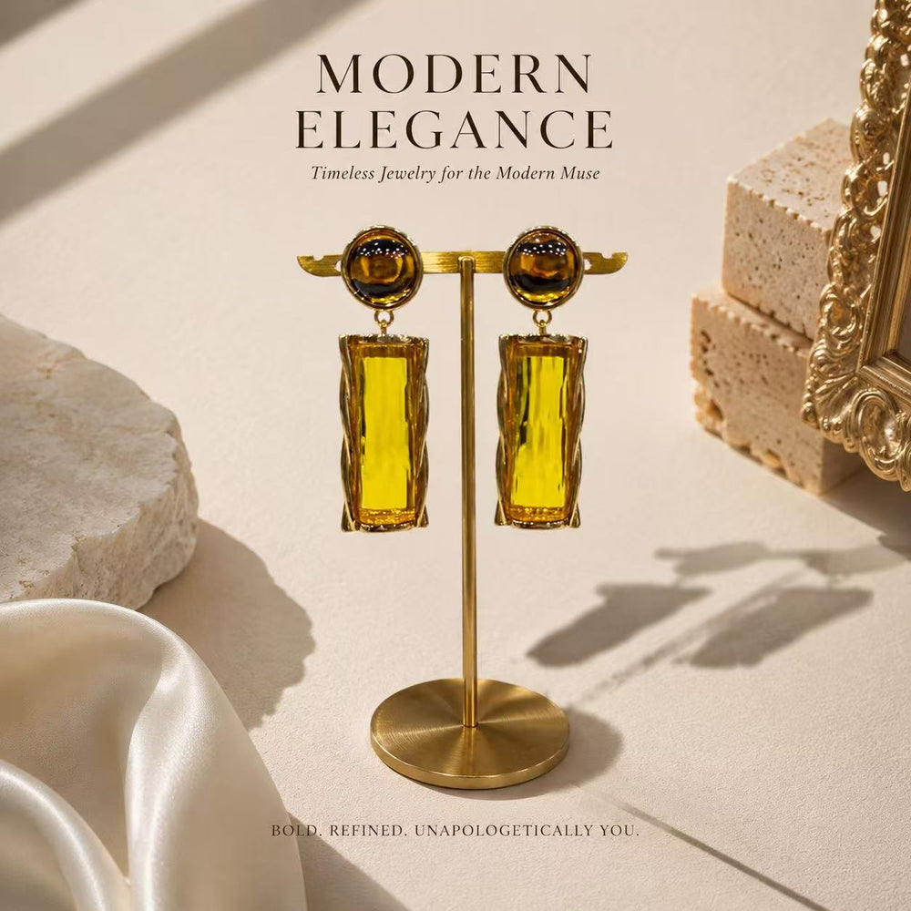 Gold-tone amber glass-style rectangular drop stud earrings display view