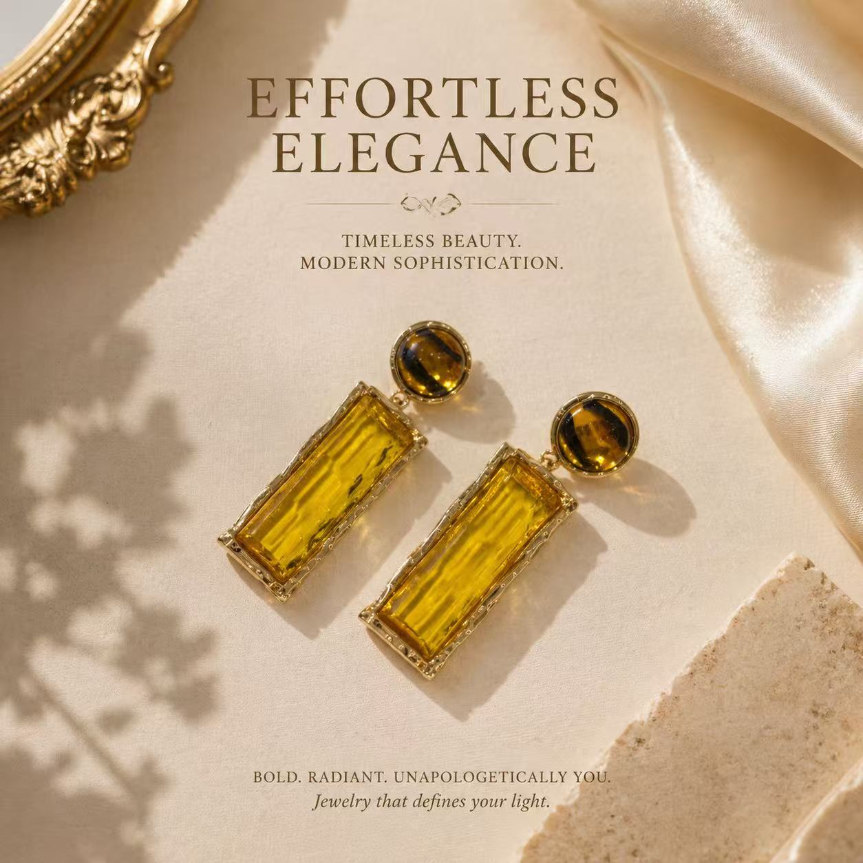 Gold-tone amber glass-style rectangular drop stud earrings flat lay