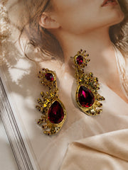 Gold-tone Barbie pink red crystal-style teardrop stud earrings close view