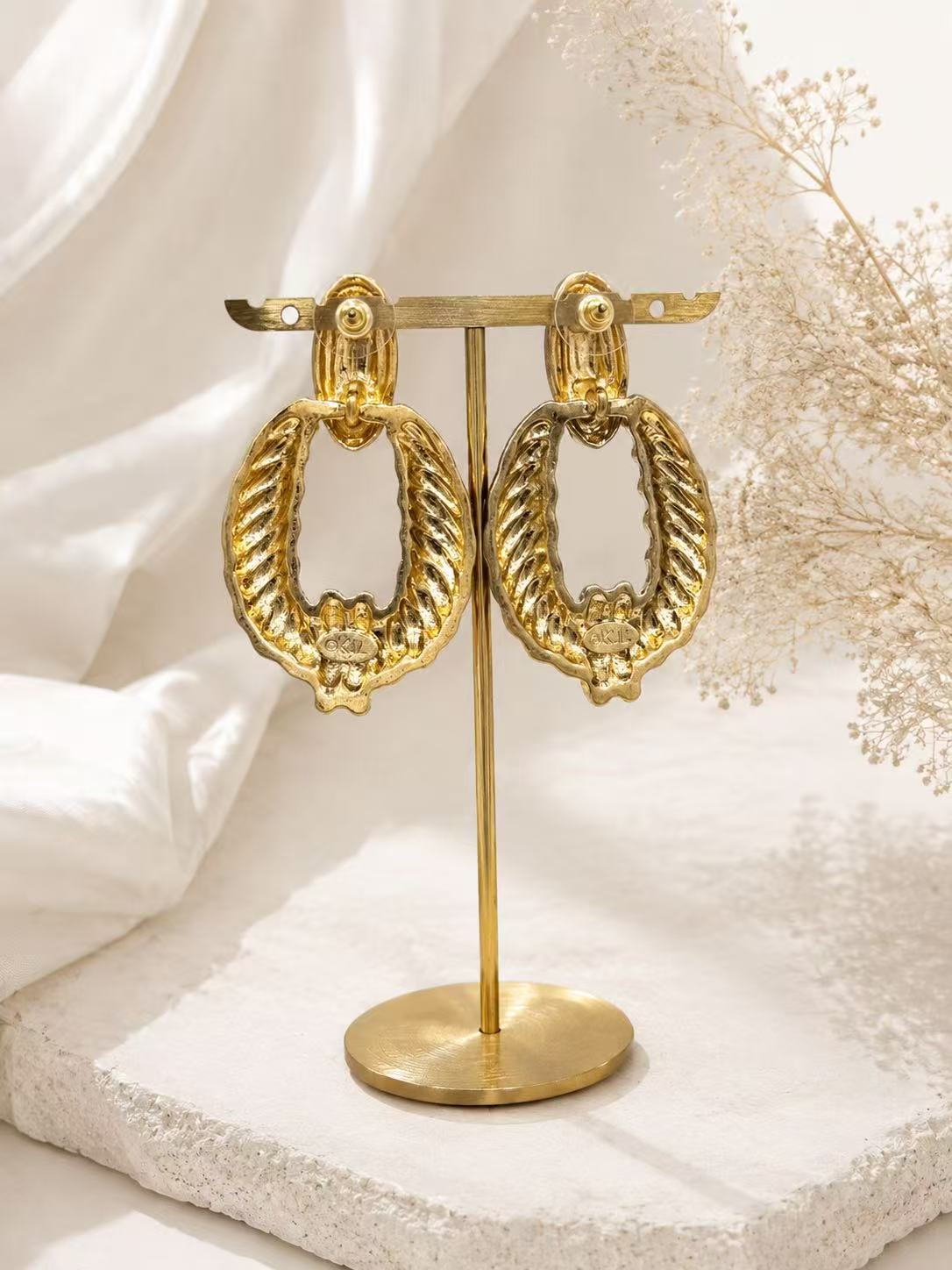 Gold-tone zebra stripe statement earrings with post backs