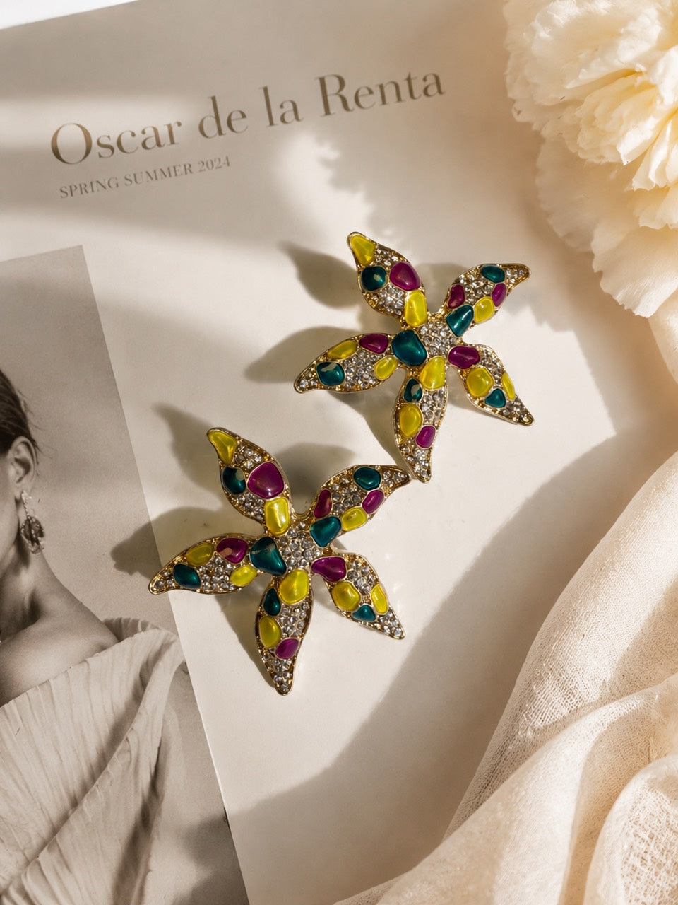 Gold-tone Citrus Multi crystal-style starfish stud earrings pair display