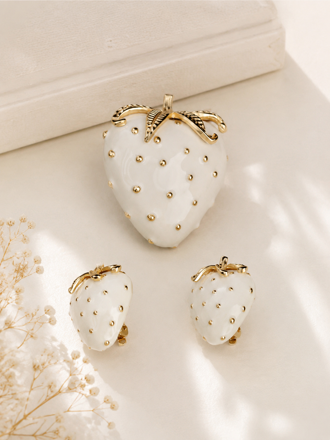 Gold-tone cream enamel-style strawberry brooch and stud earrings set
