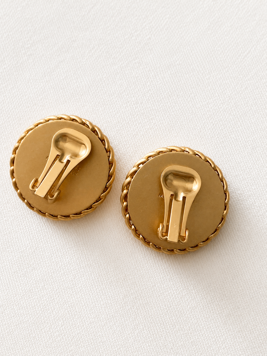 Gold-tone crystal medallion clip-on earrings back view