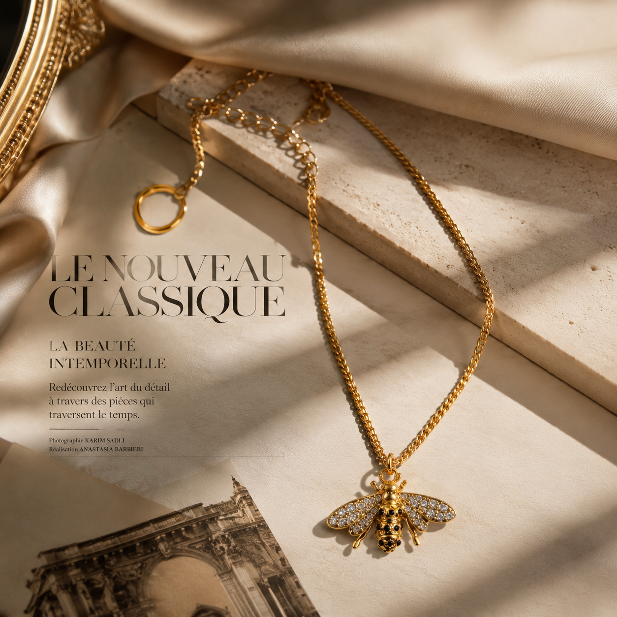 Gold-tone clear crystal accent bee pendant necklace editorial flat lay