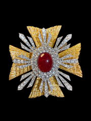 Gold-tone crystal-style cross statement brooch with red cabochon-style center front view