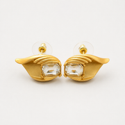 Gold-tone clear crystal-style leaf stud earrings pair