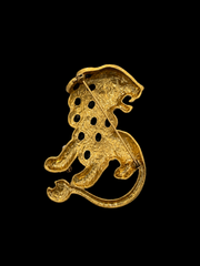 Gold-tone black crystal-style lion statement brooch back pin detail
